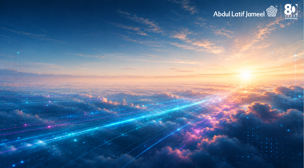 Abdul Latif Jameel, 80 Years and Beyond. Sunrise above clouds with connected light trails.